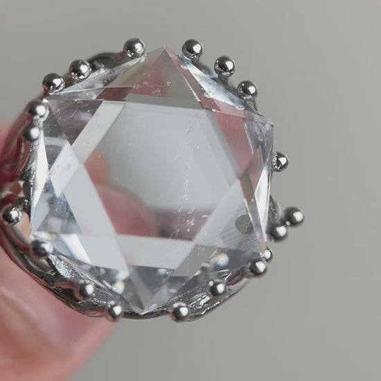 Video of Brazilian Clear Quartz six-point geometric ring with faceted crystal design