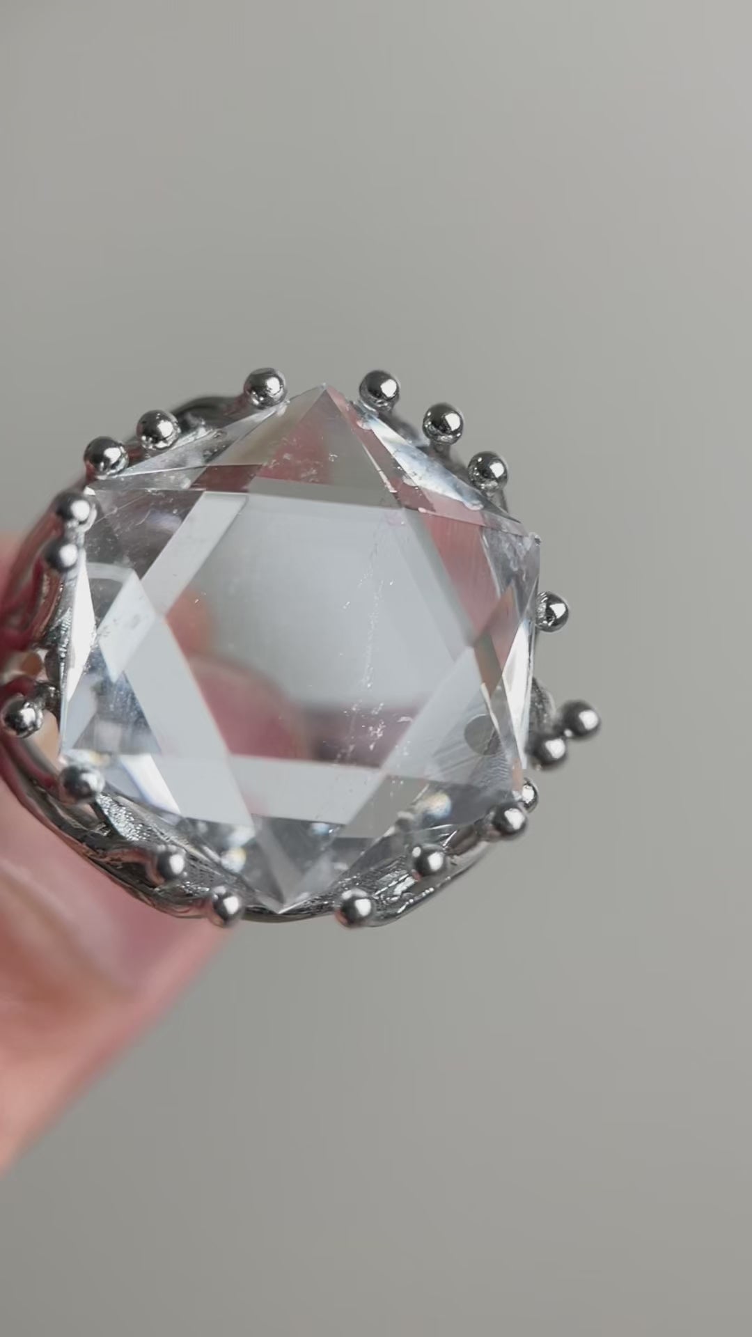 Video of Brazilian Clear Quartz six-point geometric ring with faceted crystal design