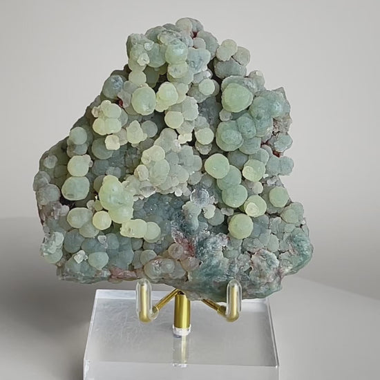 Video of raw green prehnite cluster mineral specimen from Morocco with soft green crystal texture