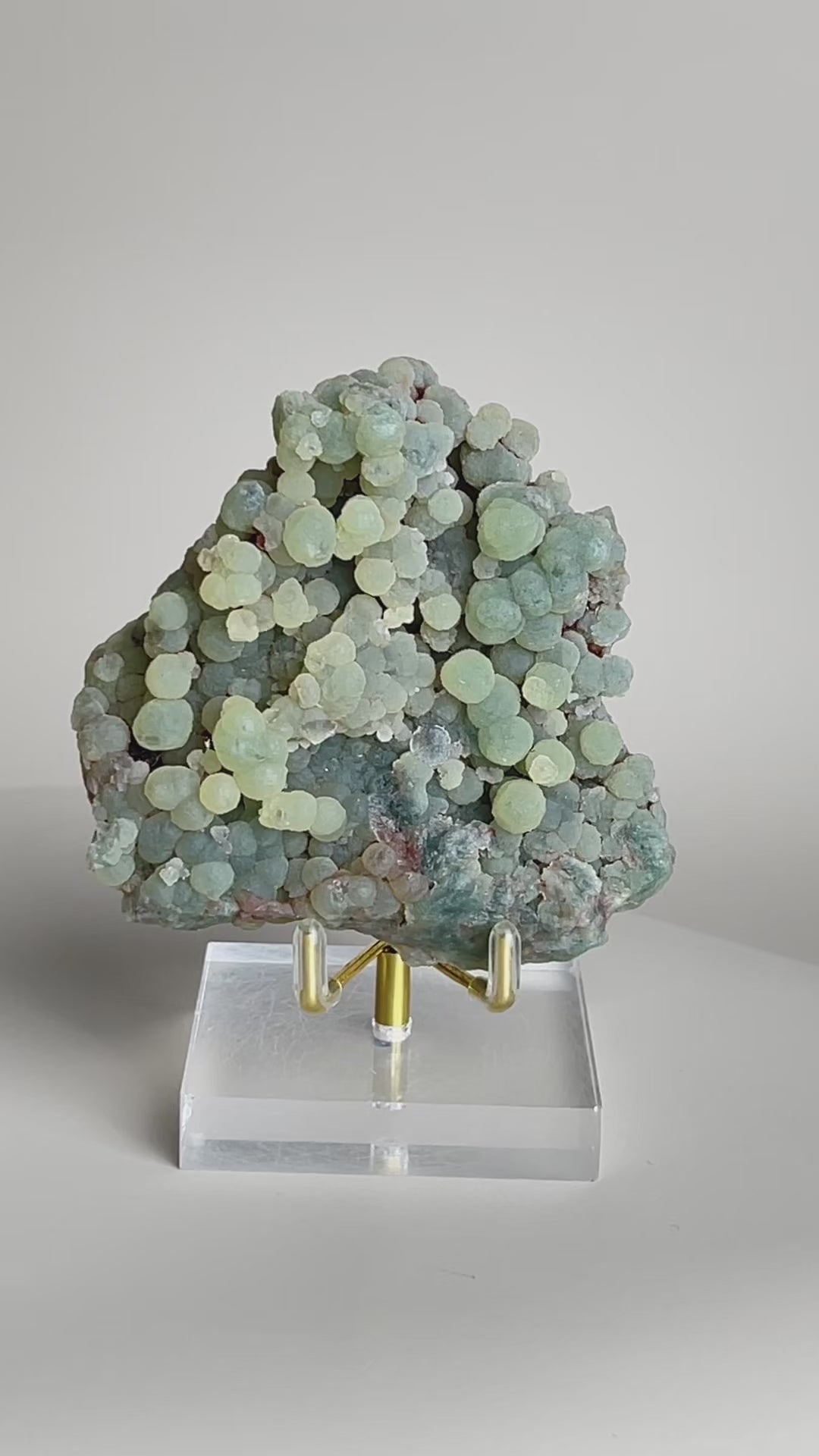 Video of raw green prehnite cluster mineral specimen from Morocco with soft green crystal texture