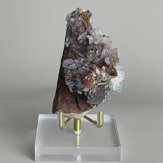 Video of Raw Creedite flower mineral specimen on matrix from China