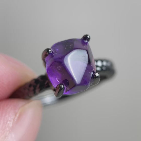 Video of Brazilian amethyst freeform ring showing polished purple quartz