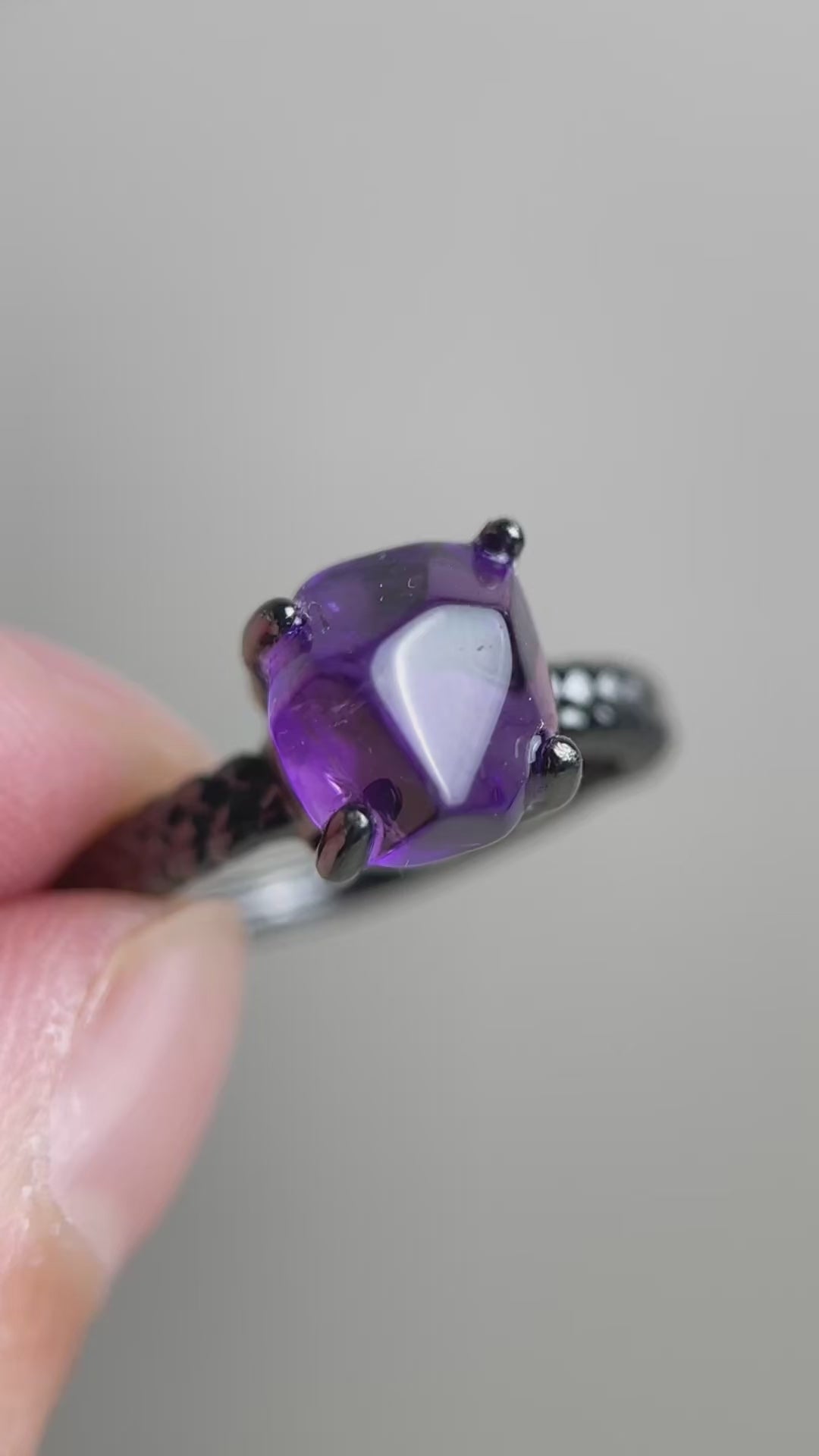Video of Brazilian amethyst freeform ring showing polished purple quartz