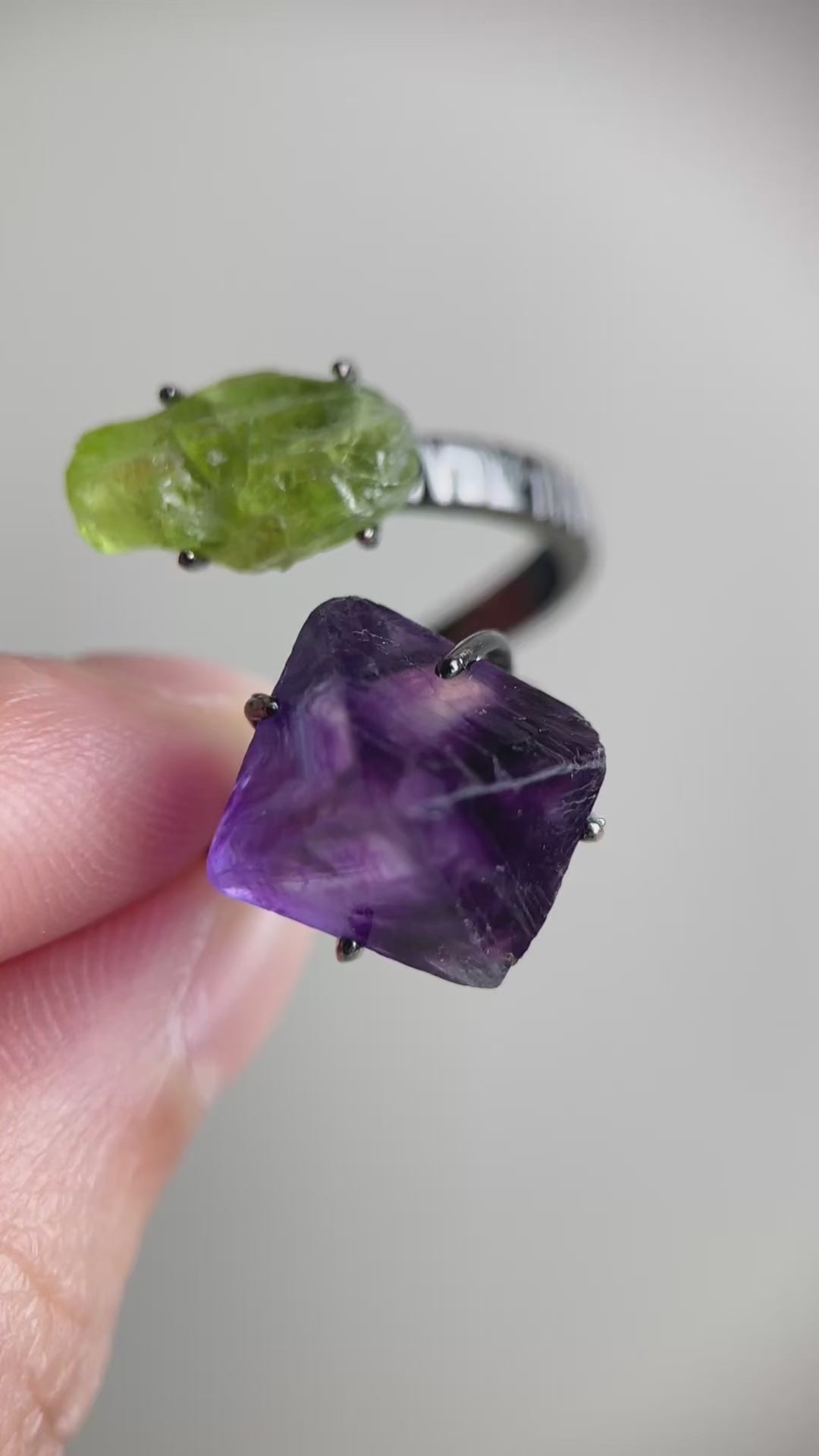 Video of raw peridot and purple octahedral fluorite ring