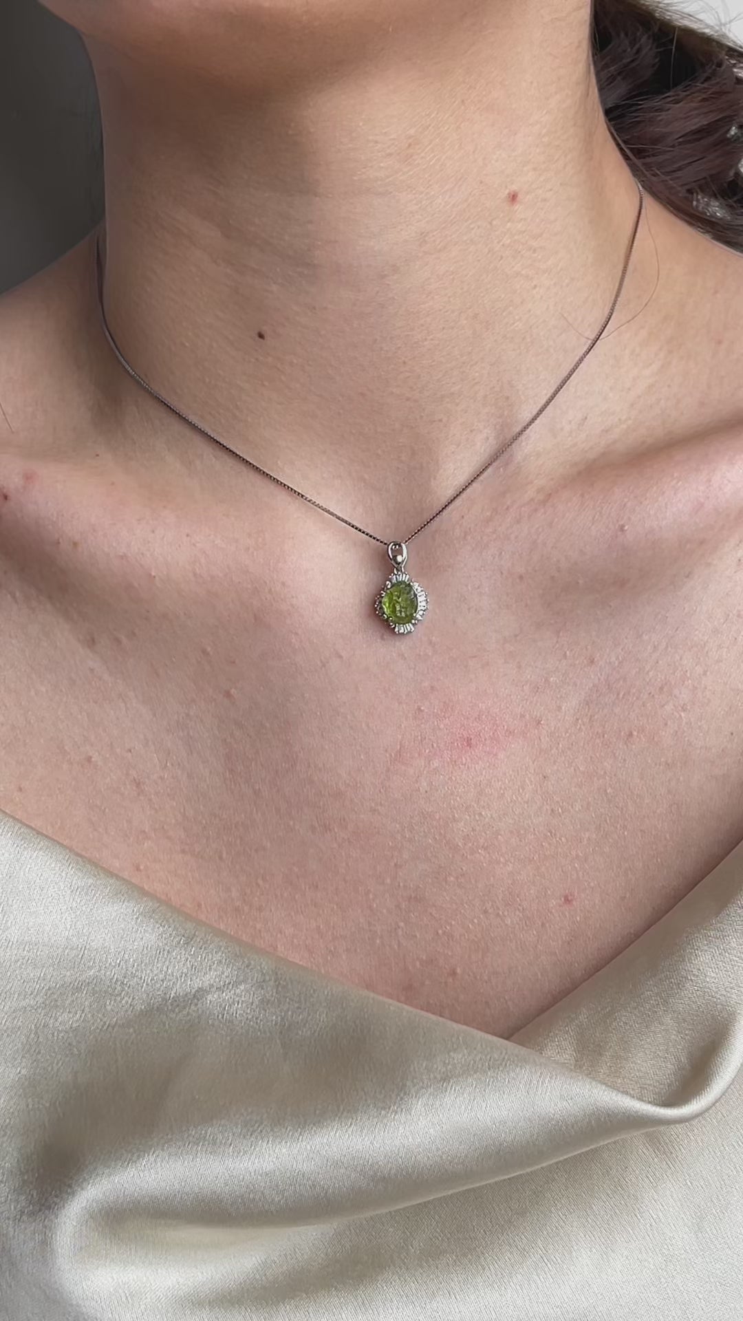 Peridot necklace in sterling silver featuring natural green peridot crystal with soft olive tone, elegant everyday wear jewelry