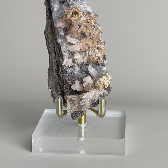Video of Raw Creedite flower mineral specimen on matrix from China