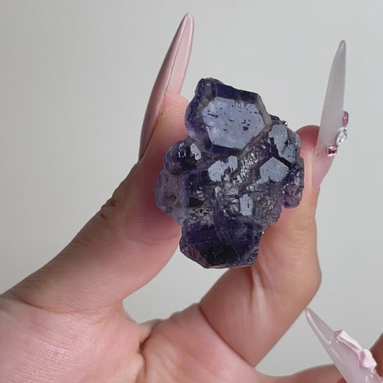 Video of raw Tanzanite Fluorite crystal ring showing blue violet fluorite crystals