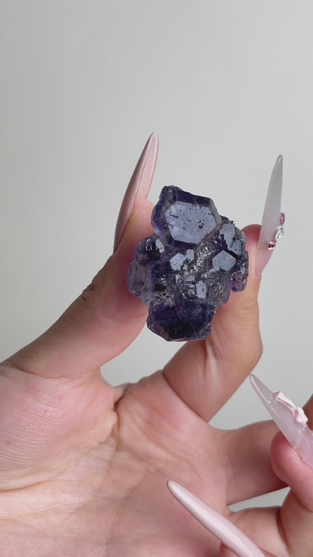 Video of raw Tanzanite Fluorite crystal ring showing blue violet fluorite crystals
