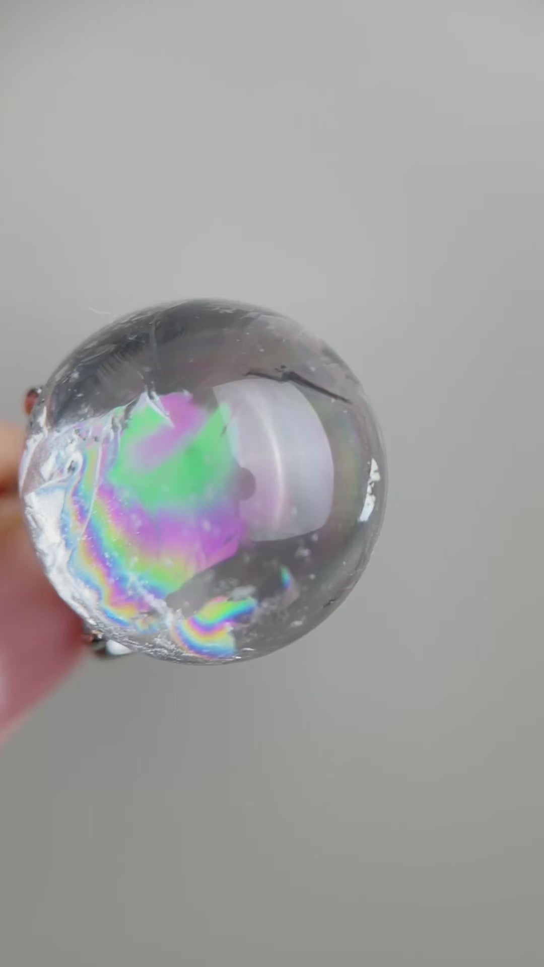 Rainbow Quartz Sphere ring video showing natural internal rainbow effect