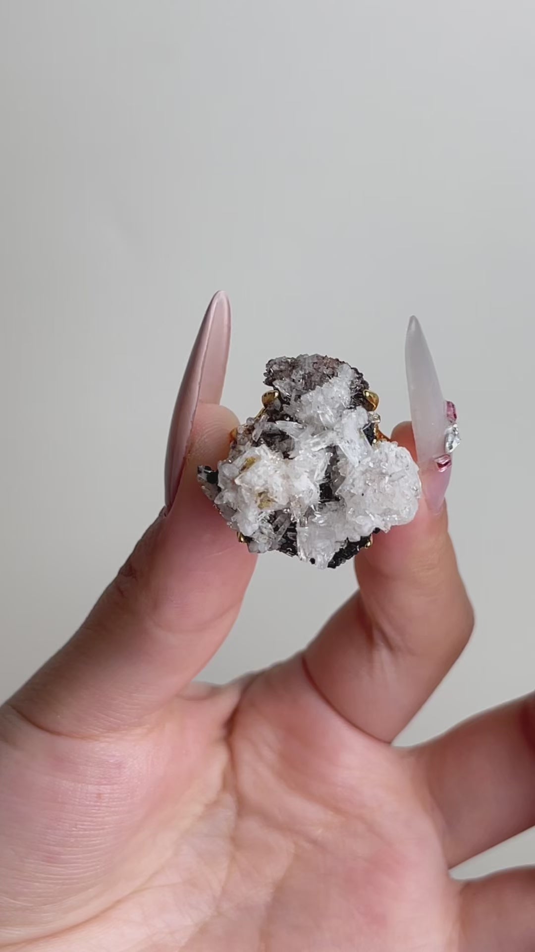 Video of raw Creedite crystal cluster ring showing natural mineral specimen texture