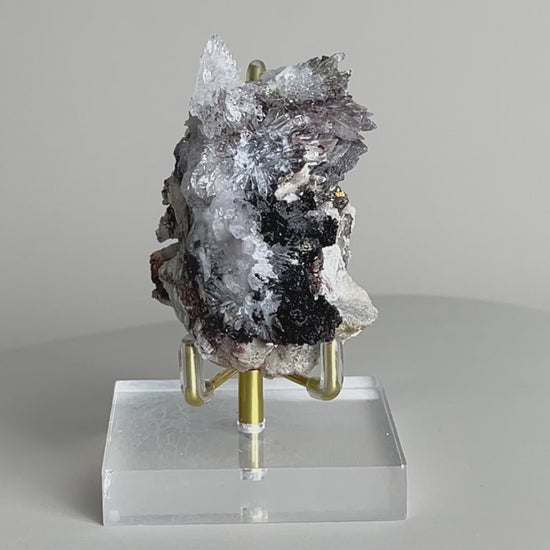 Video of Raw Creedite flower mineral specimen on matrix from China