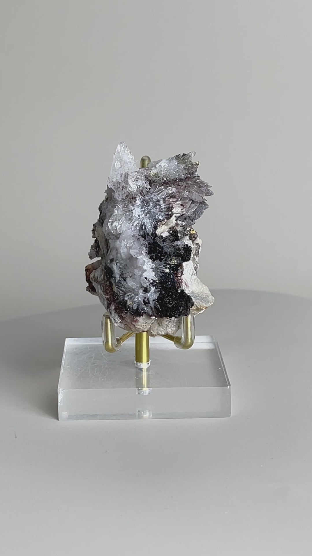 Video of Raw Creedite flower mineral specimen on matrix from China