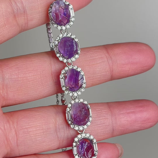 Raw amethyst bracelet worn on wrist in sterling silver