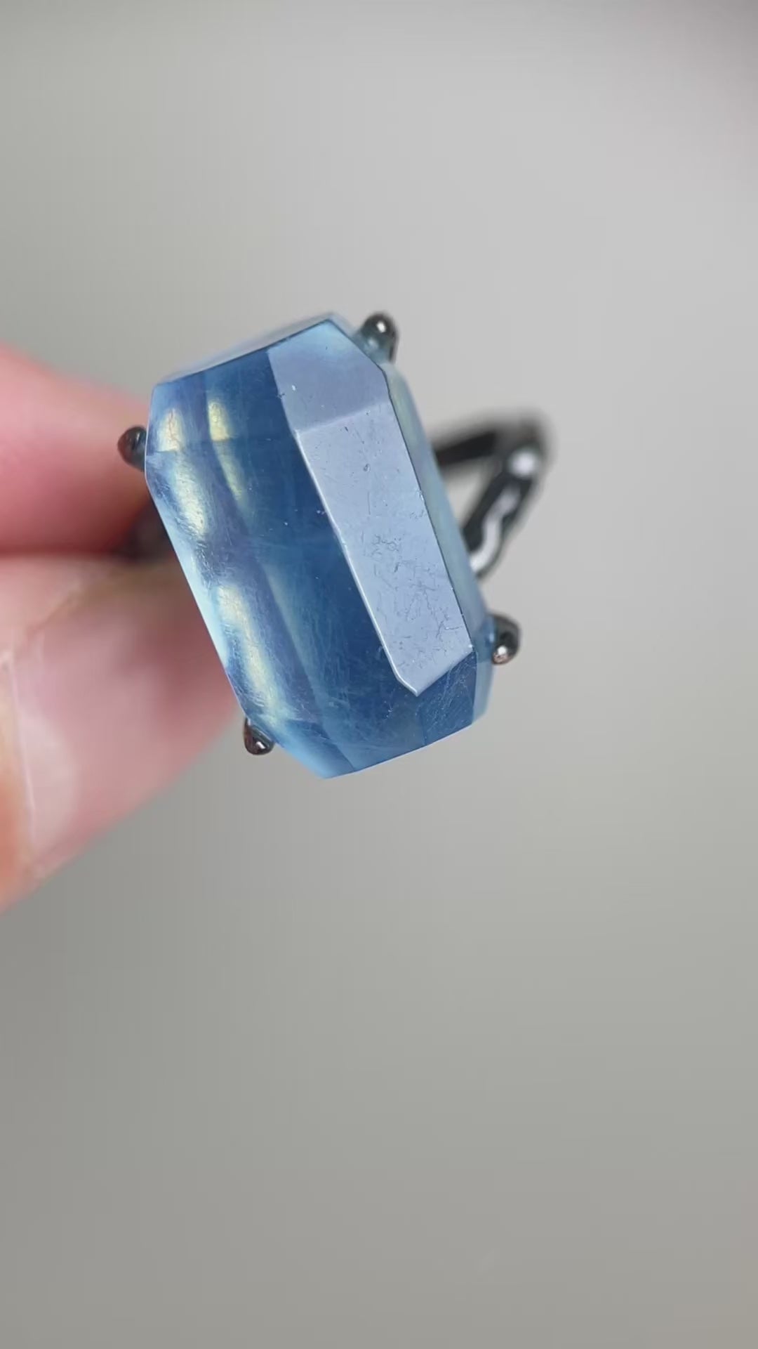 Video of Aquamarine freeform ring showing polished blue crystal detail