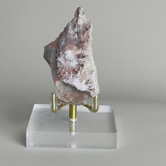 Video of Raw Creedite flower mineral specimen on matrix from China