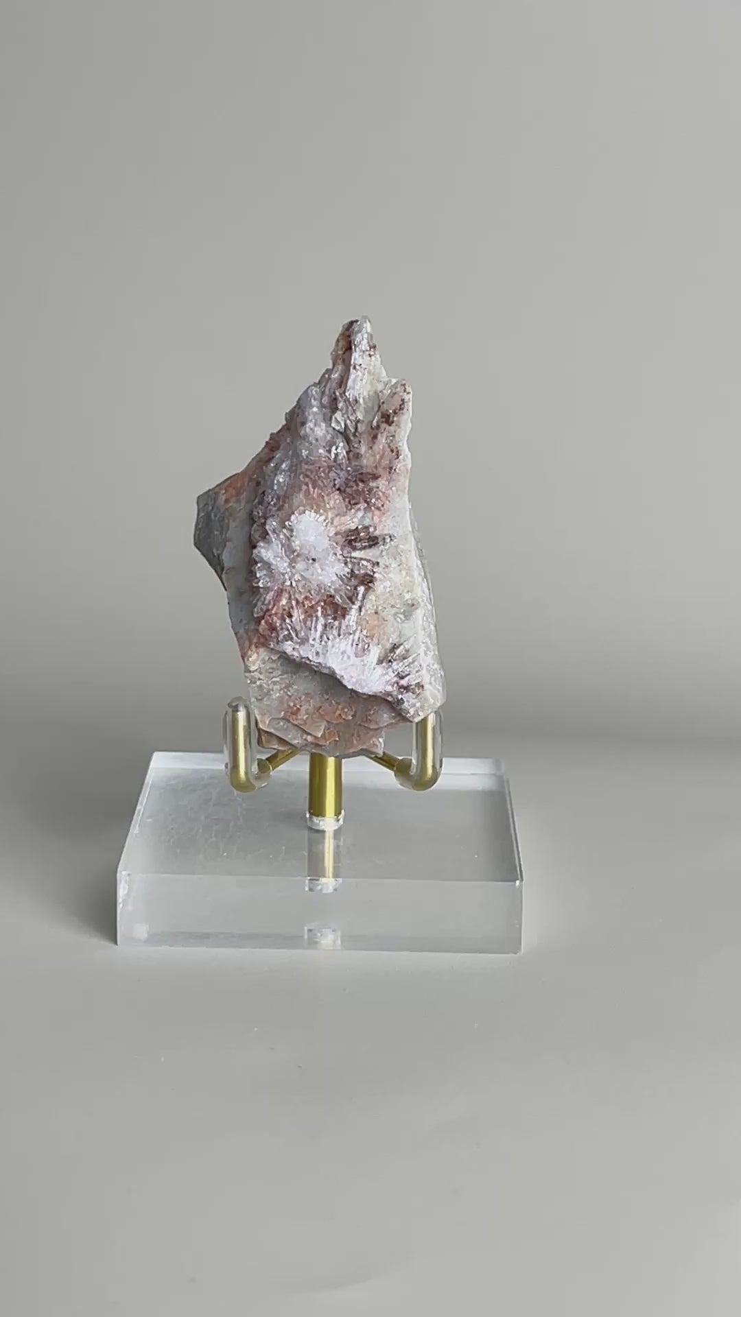 Video of Raw Creedite flower mineral specimen on matrix from China