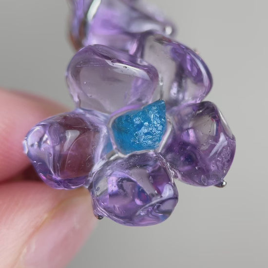 Video of Brazilian amethyst flower ring with blue apatite center