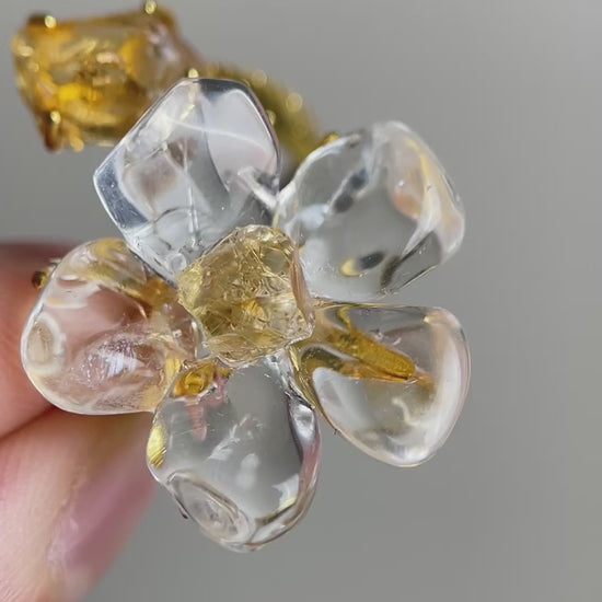 Video of Clear Quartz Flower Ring with polished quartz petals and raw Citrine accents