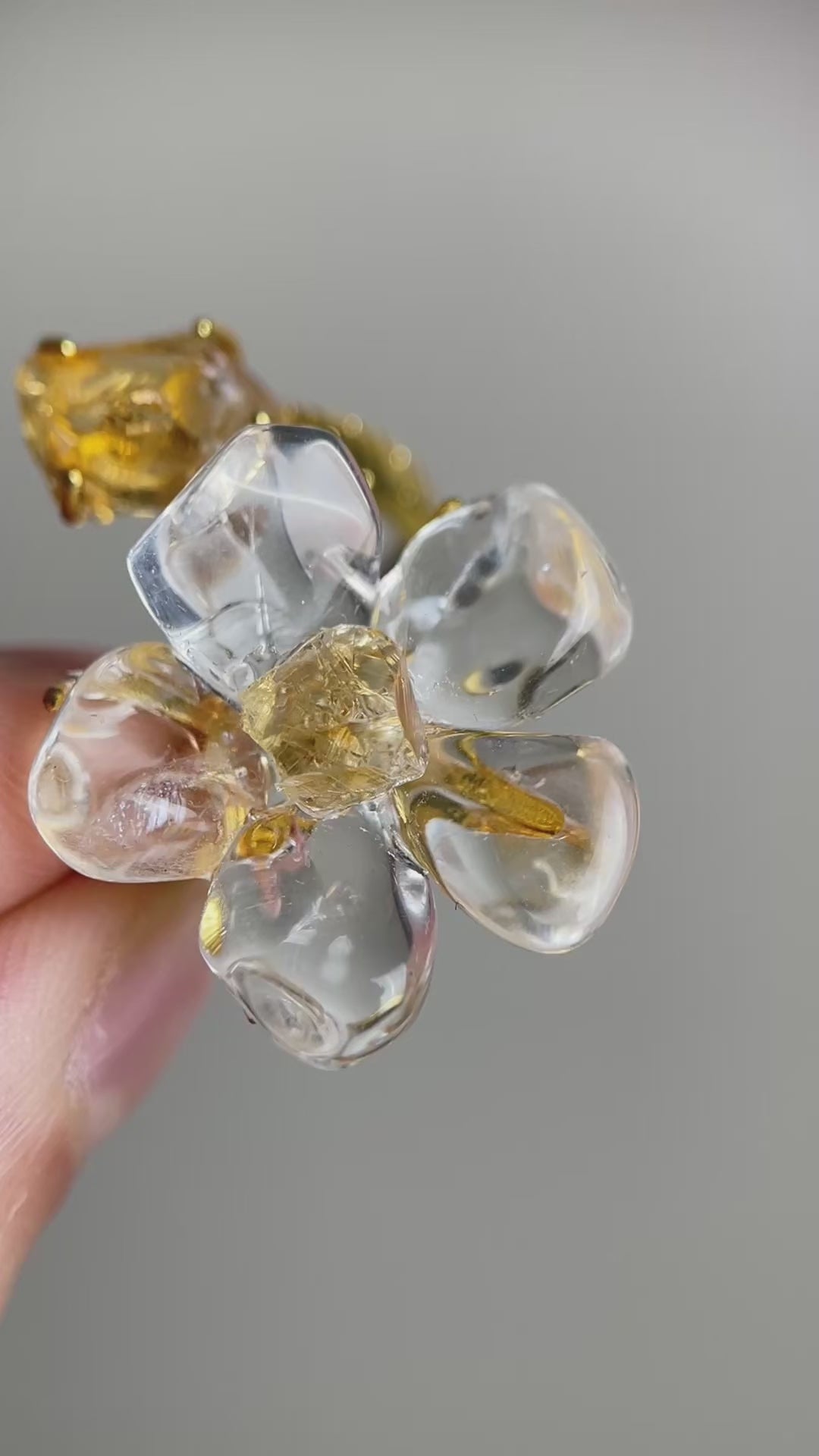 Video of Clear Quartz Flower Ring with polished quartz petals and raw Citrine accents