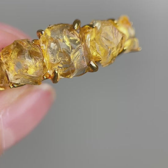 Video of Raw Citrine row ring showing golden crystal detail