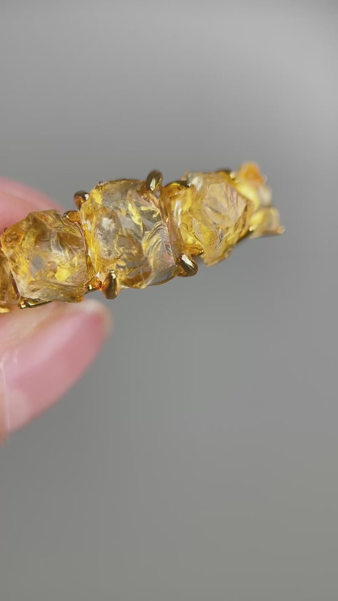 Video of Raw Citrine row ring showing golden crystal detail