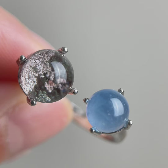 Phantom Quartz and Aquamarine sphere ring showing natural crystal detail and soft blue tones