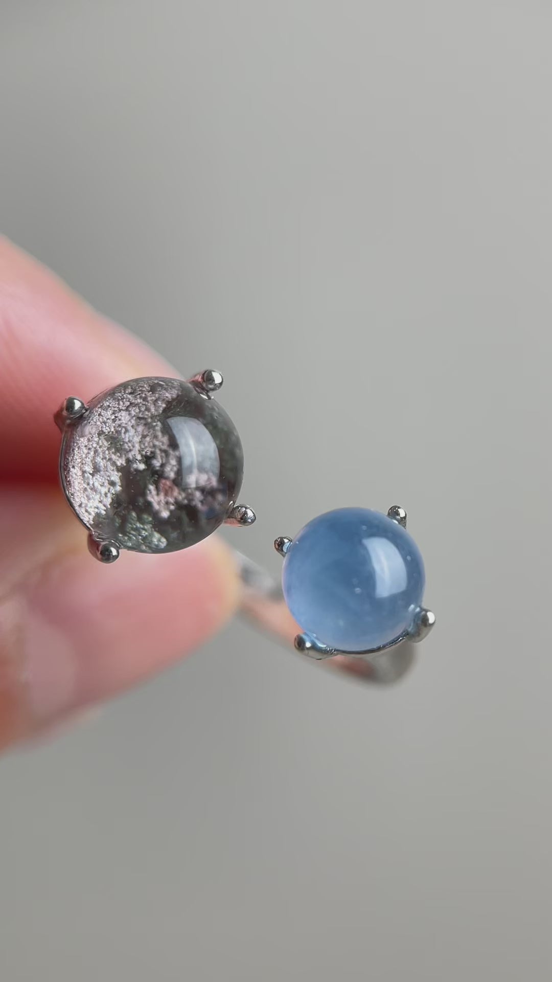 Phantom Quartz and Aquamarine sphere ring showing natural crystal detail and soft blue tones