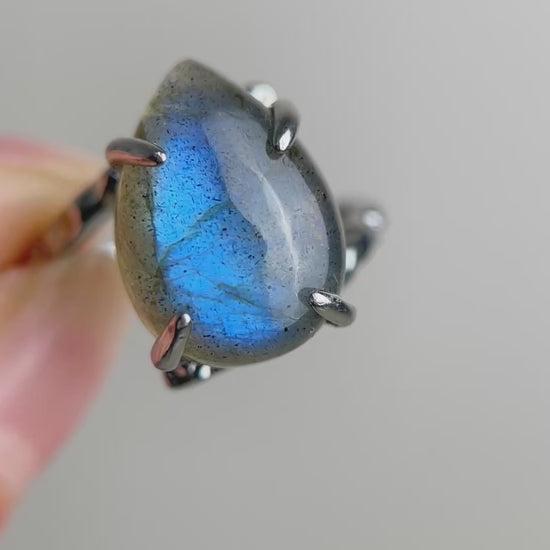 Pear cut Labradorite ring from India with shifting blue flash in silver tone setting