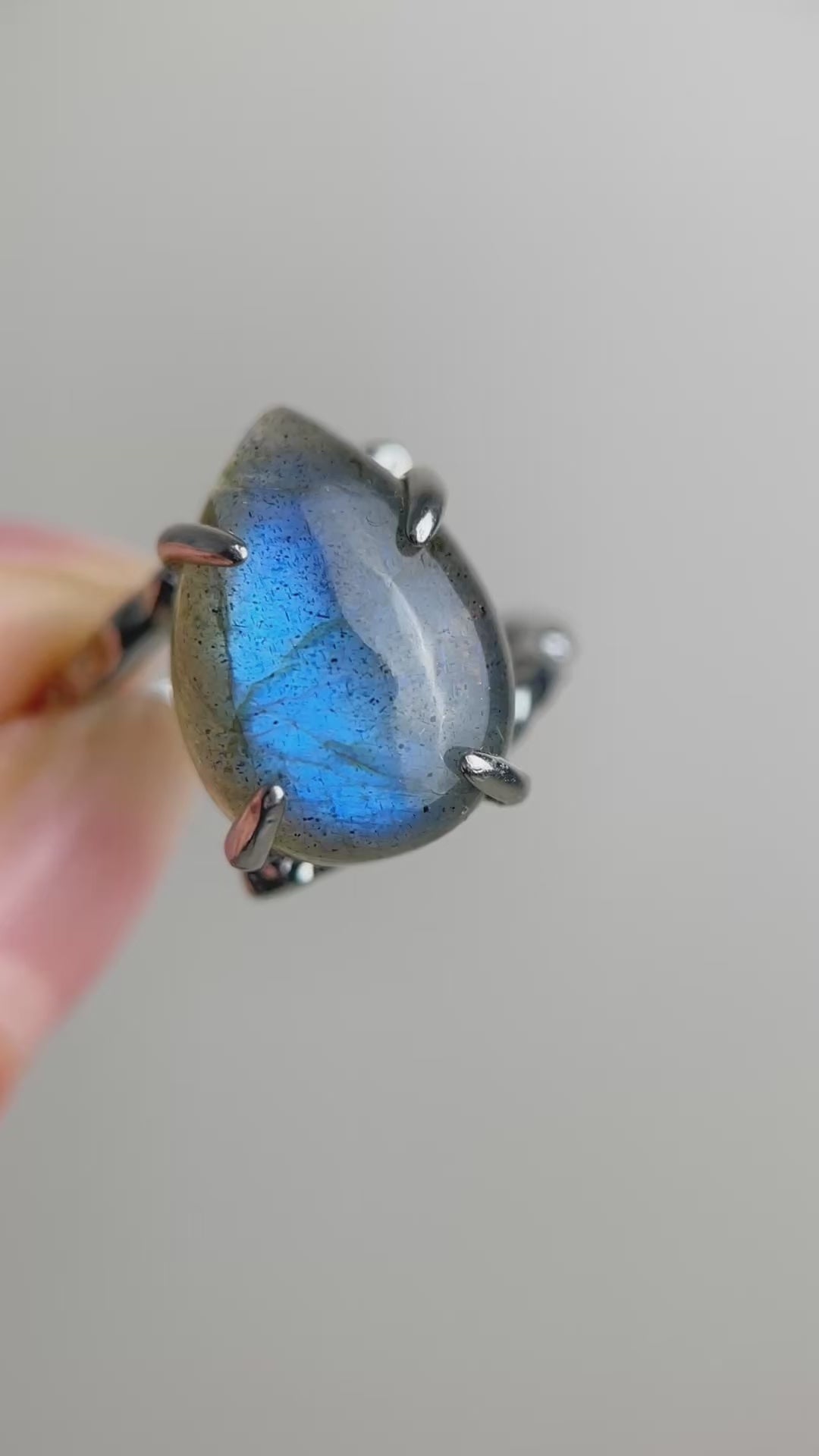 Pear cut Labradorite ring from India with shifting blue flash in silver tone setting