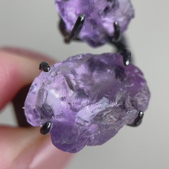 Video of raw Brazilian amethyst ring with natural purple crystal texture