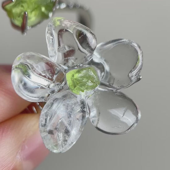 Clear Quartz Flower Ring with raw Peridot, side view