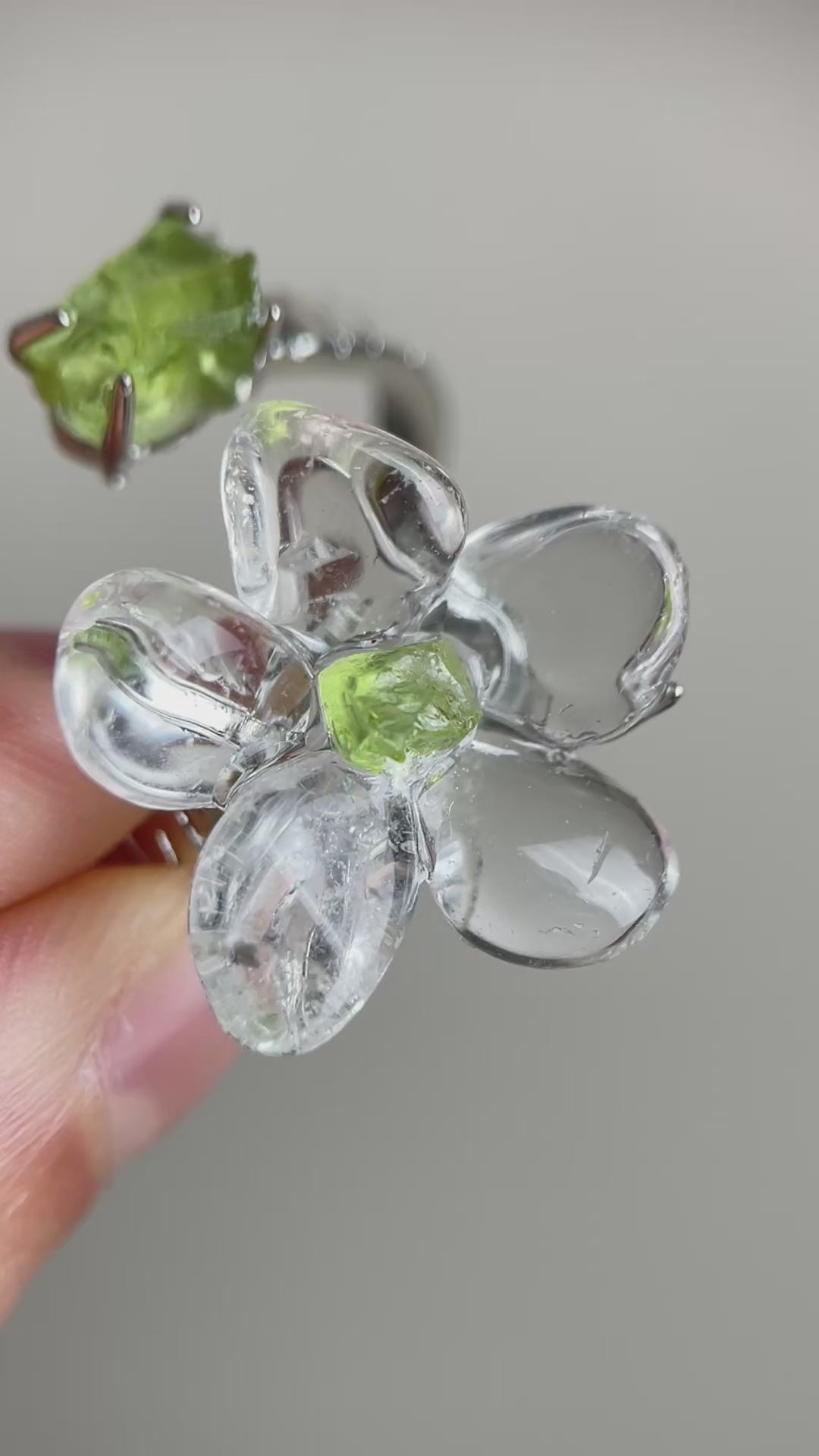 Clear Quartz Flower Ring with raw Peridot, side view
