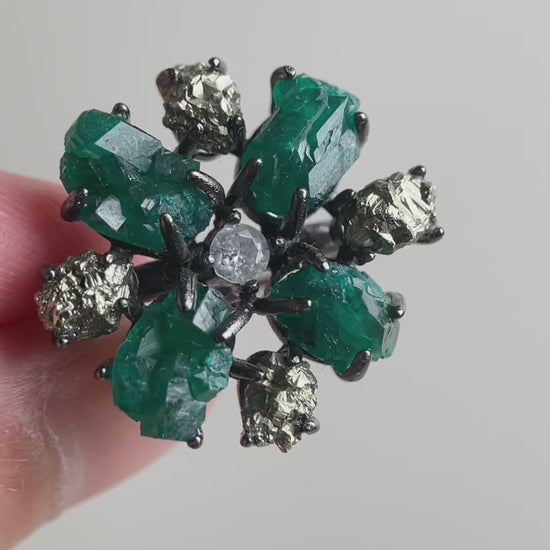 Video of raw Dioptase and Chalcopyrite snowflake ring showing vivid green and metallic gold minerals