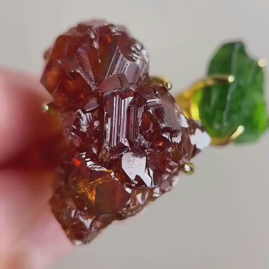 Video of raw garnet and chrome diopside ring