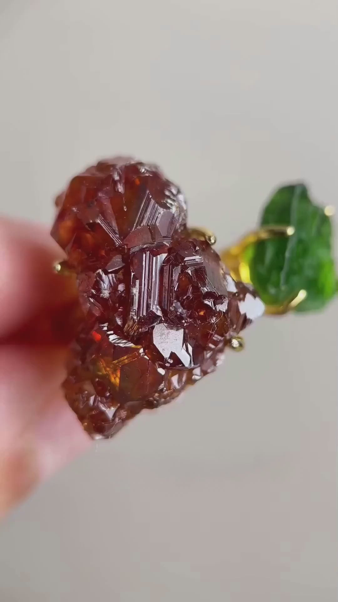 Video of raw garnet and chrome diopside ring