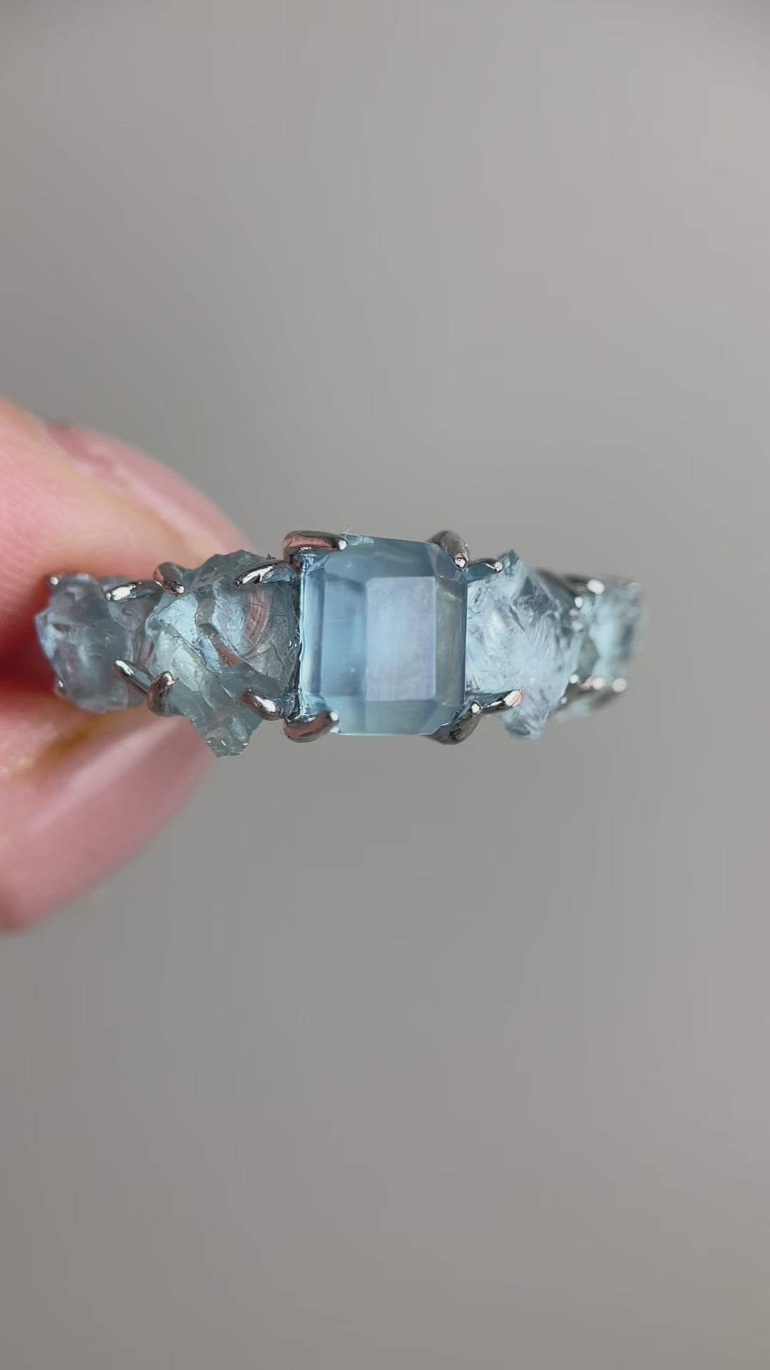 Video of aquamarine row ring with hand cut aquamarine and raw aquamarine natural crystal jewelry