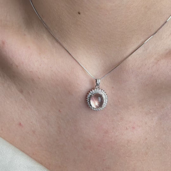 Video of Star Rose Quartz necklace in sterling silver showing soft pink tone and polished crystal detail