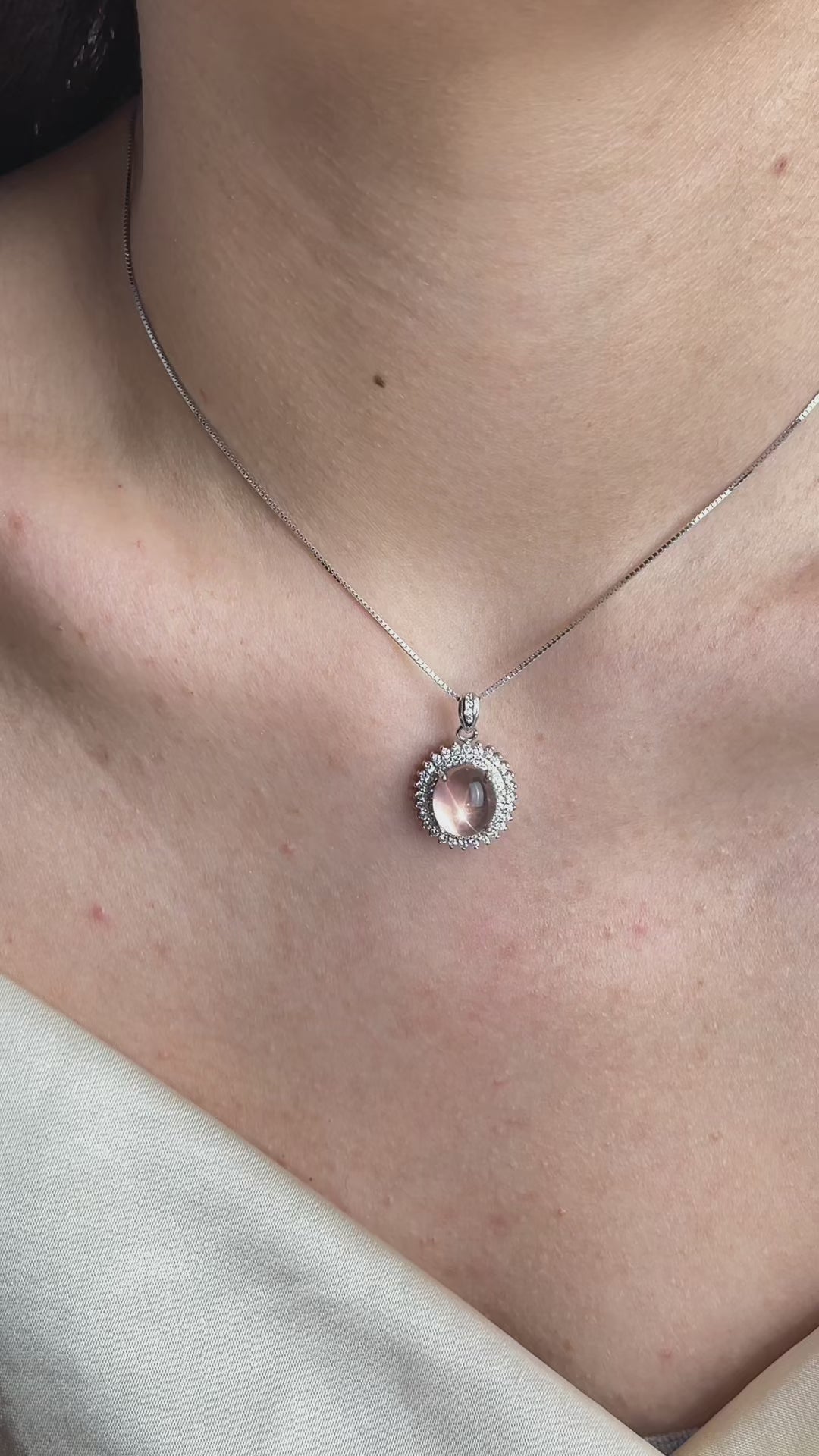 Video of Star Rose Quartz necklace in sterling silver showing soft pink tone and polished crystal detail