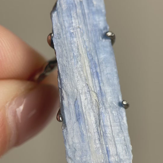 Video of blue kyanite mineral specimen ring showing raw crystal structure and natural striations