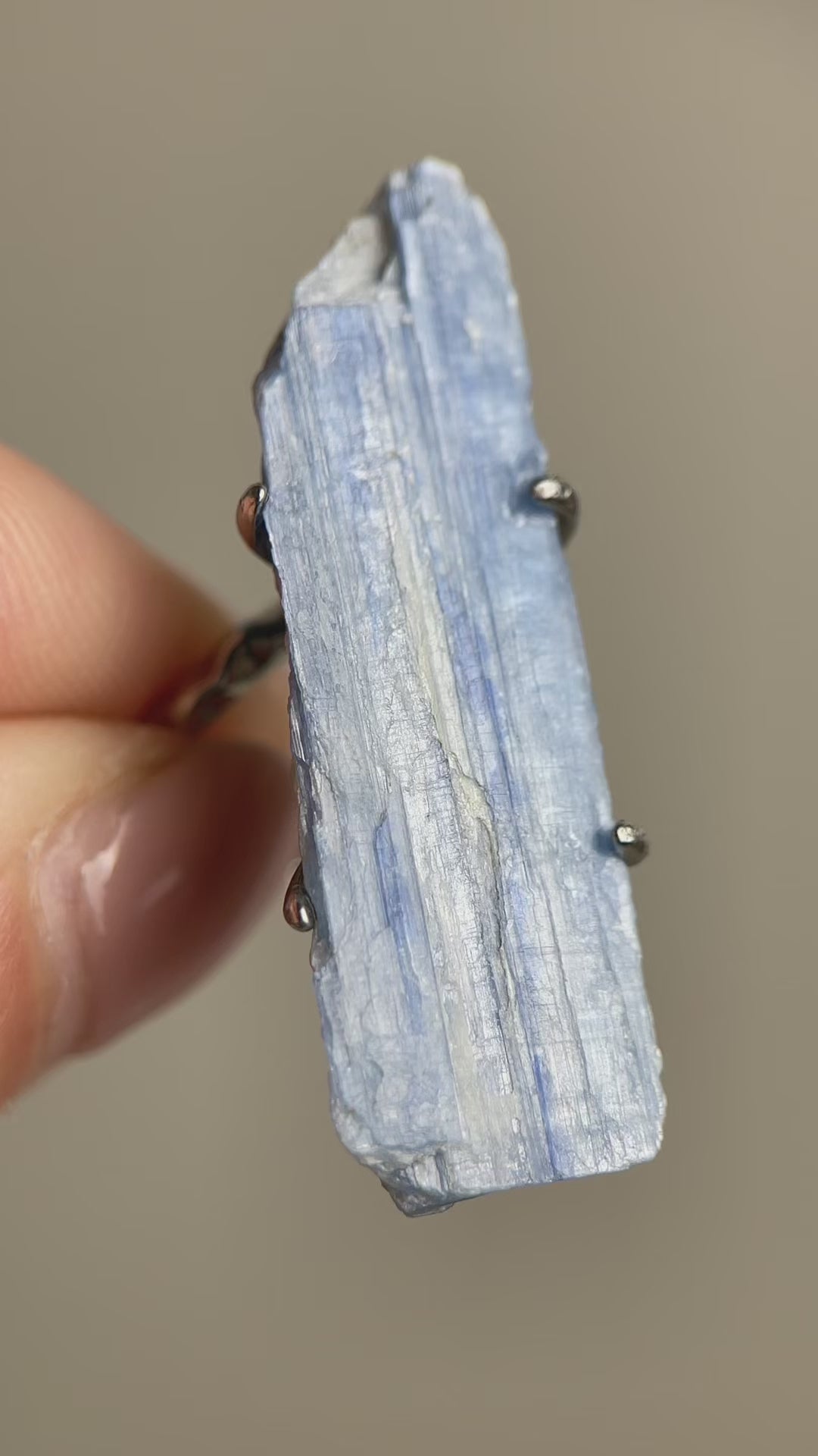 Video of blue kyanite mineral specimen ring showing raw crystal structure and natural striations