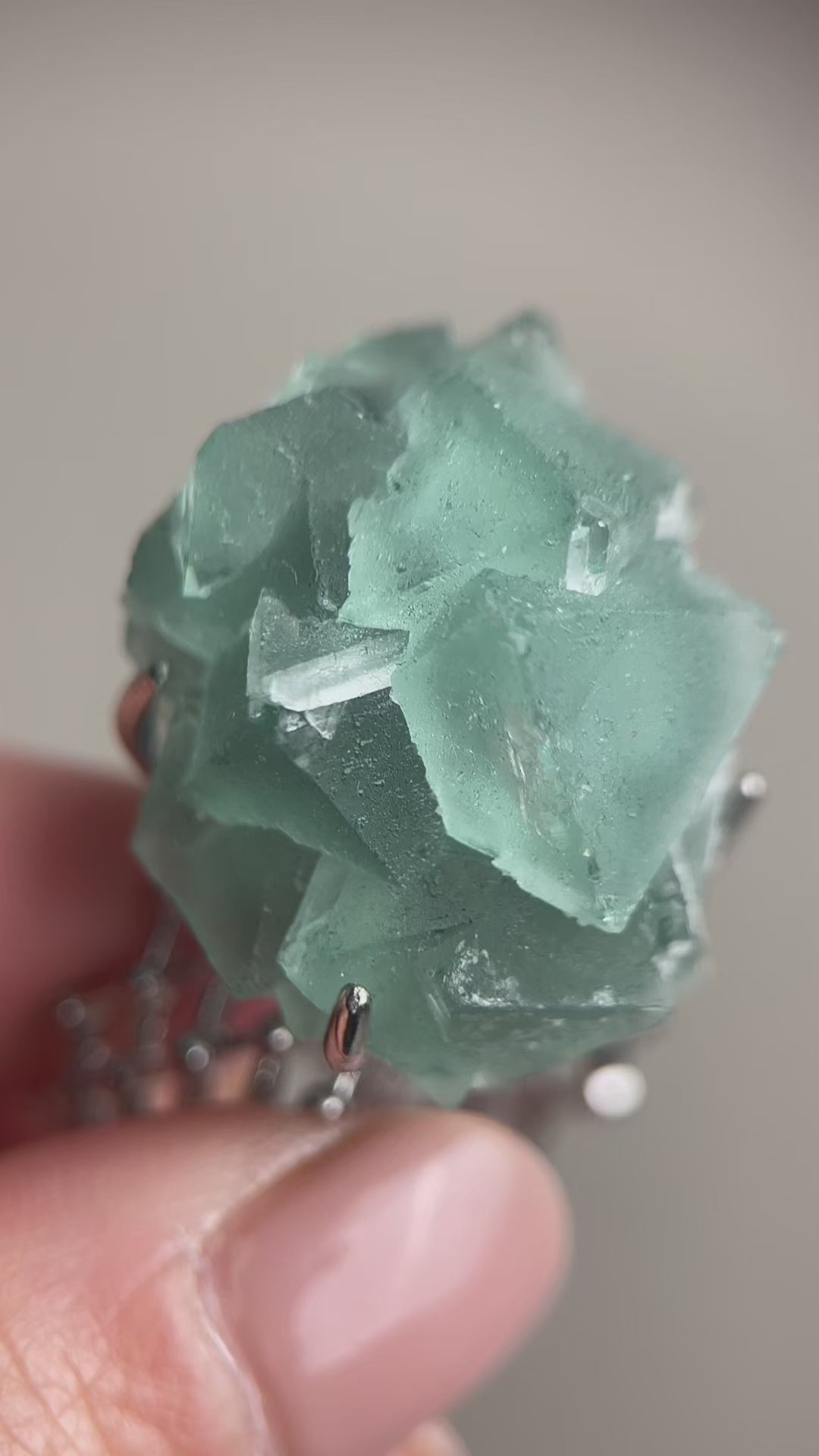 Octahedral green fluorite mineral specimen ring featuring natural geometric crystal formation, a rare raw crystal jewelry piece with collector appeal
