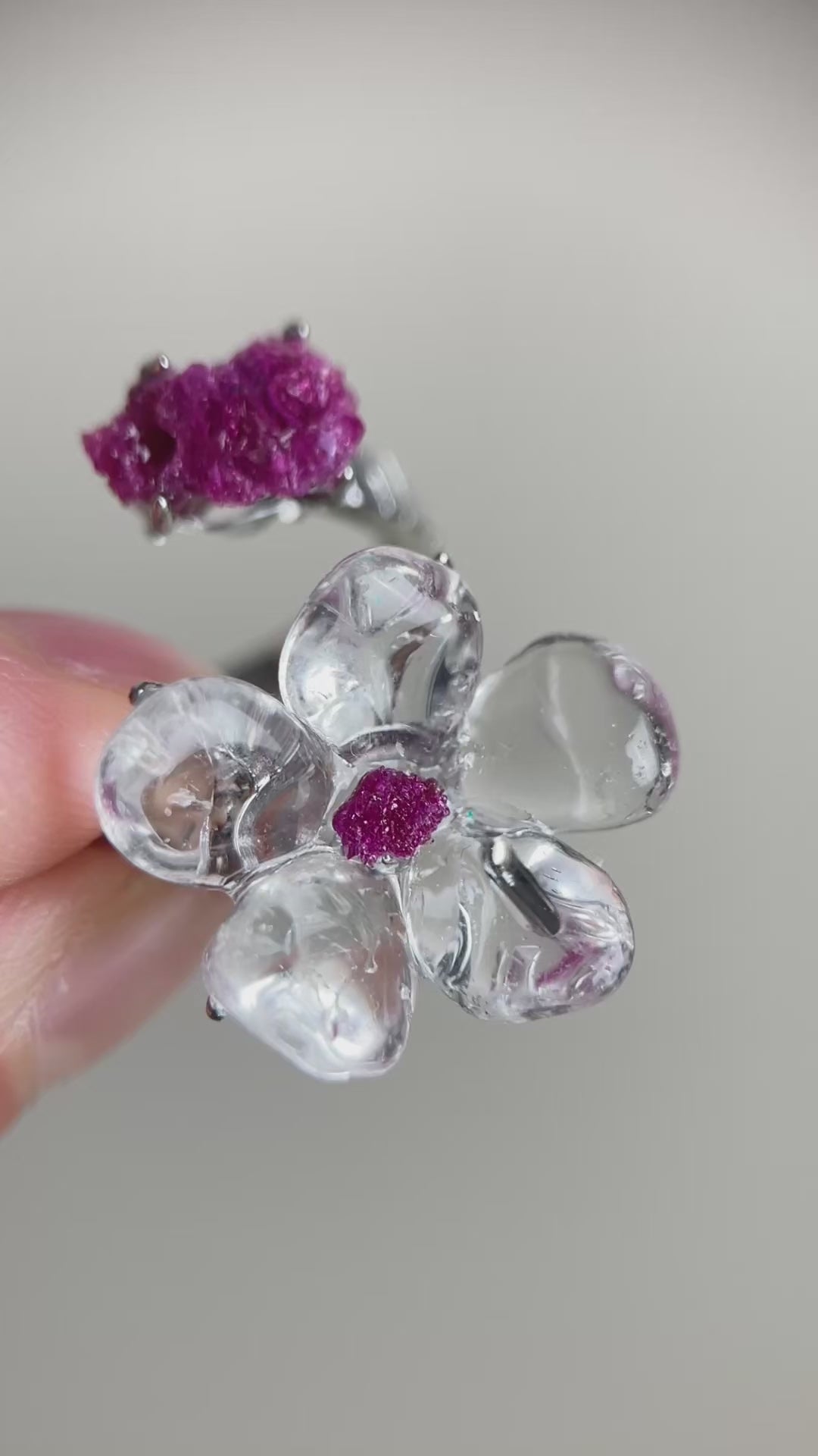 Video of Clear Quartz Flower Ring with polished quartz petals and raw Ruby accents