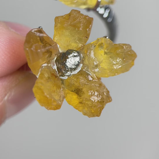 Video of raw citrine flower ring with chalcopyrite center