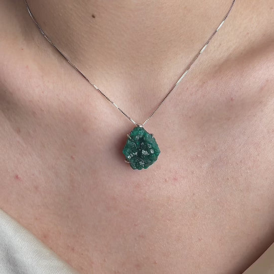 Video of Dioptase necklace in sterling silver showing vivid green crystal and natural texture
