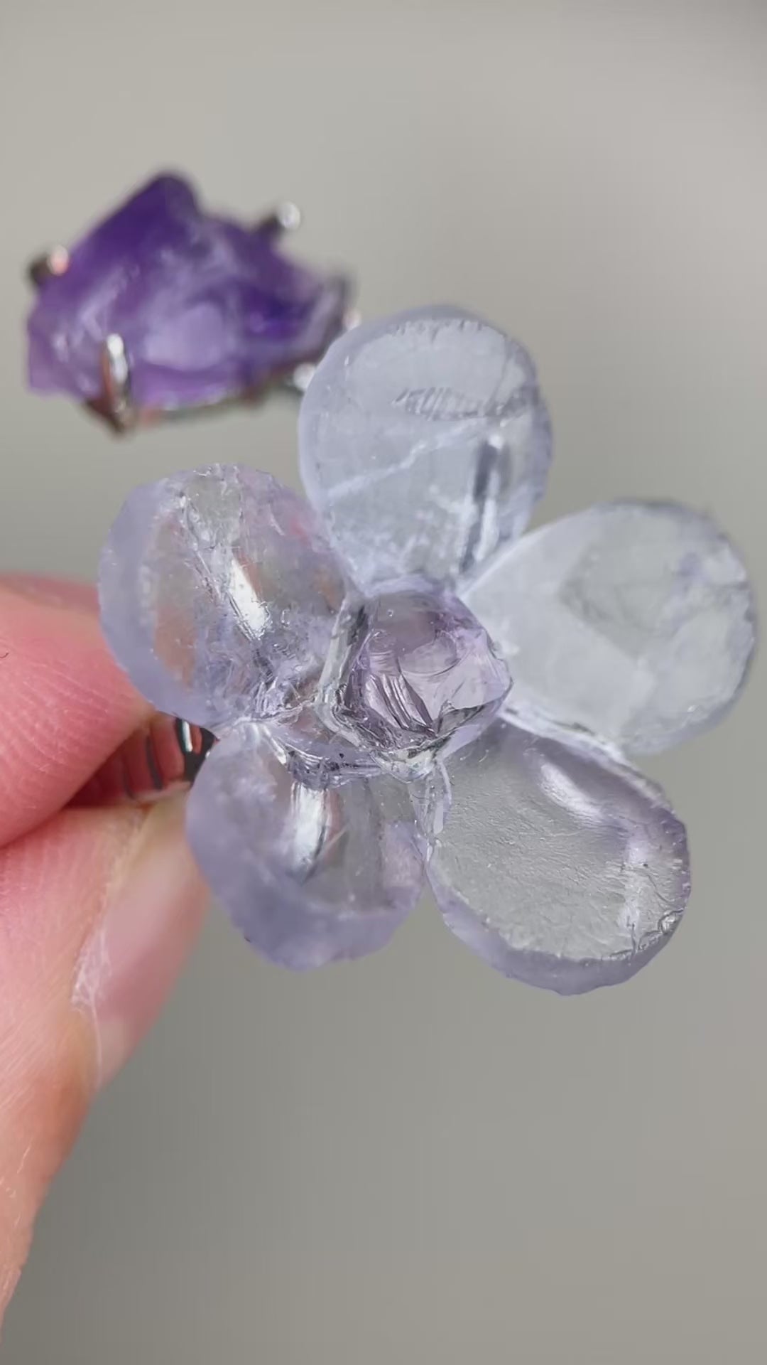 Video of Purple Fluorite and Amethyst crystal flower ring showing translucent purple detail