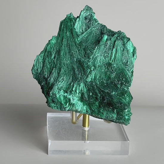 Video of raw fibrous malachite fan cluster mineral specimen with deep green needle-like texture