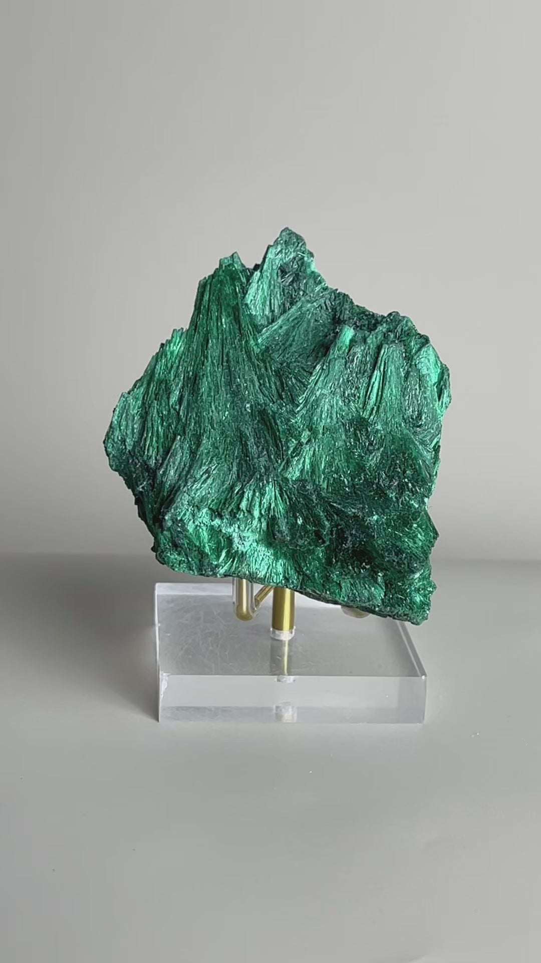 Video of raw fibrous malachite fan cluster mineral specimen with deep green needle-like texture