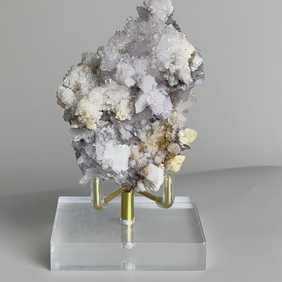 Video of Raw Creedite cluster mineral specimen on matrix from China