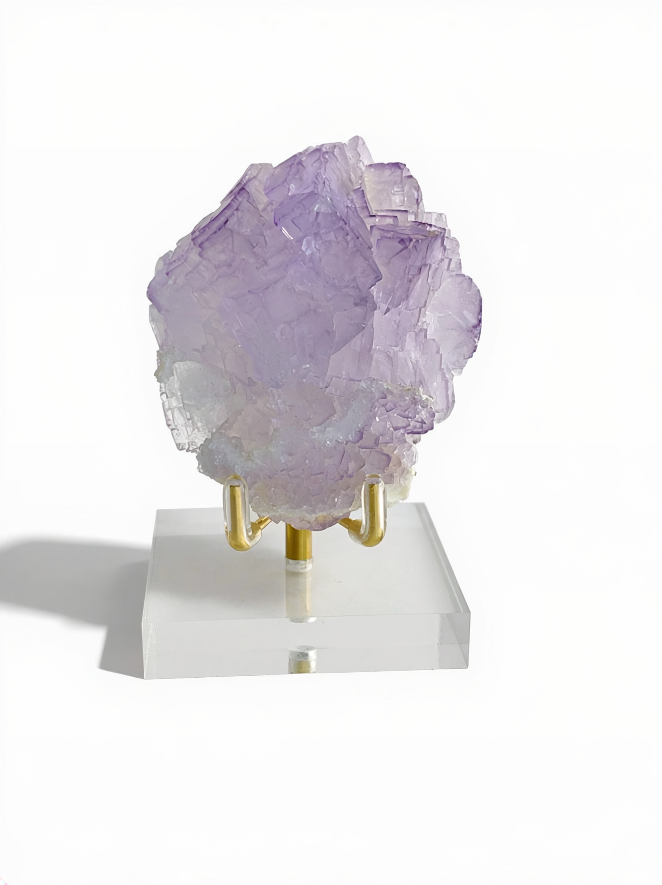 Purple fluorite on matrix from China with cubic crystal formation front view