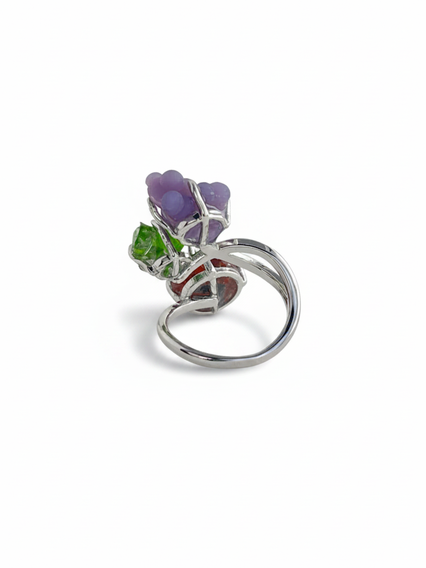 Back view of purple grape agate, chrome diopside and raw garnet ring with silver tone band